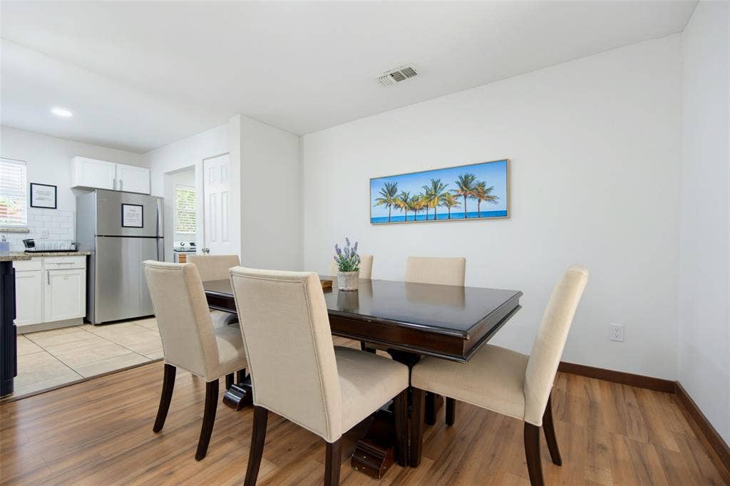 1816 Boyd Street, Dallas, TX 75224 Wood-finish flooring throughout, with light-toned wall paint and white trim