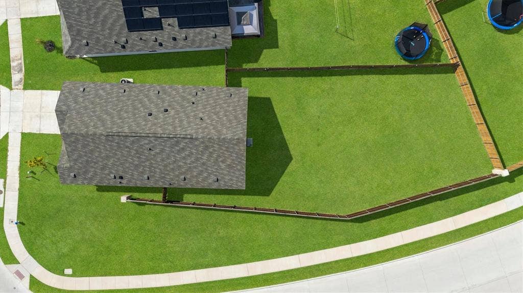 500 Waymaker Way, Princeton, TX 75407 View of home and lot. HOA takes care of the side fence.