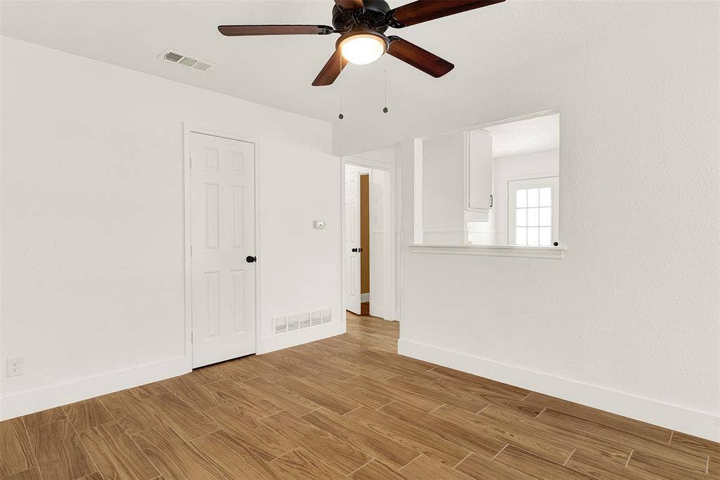 306 Hilltop Avenue, #A, Richardson, TX 75081 6" trim molding on baseboard throughout