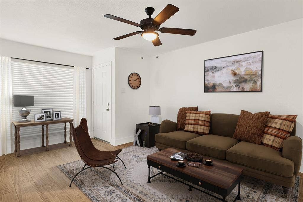 306 Hilltop Avenue, #A, Richardson, TX 75081 Living room with light wood-type flooring and ceiling fan (Virtual Staged)