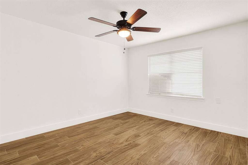 306 Hilltop Avenue, #A, Richardson, TX 75081 Unfurnished room with light hardwood / wood-style flooring and ceiling fan
