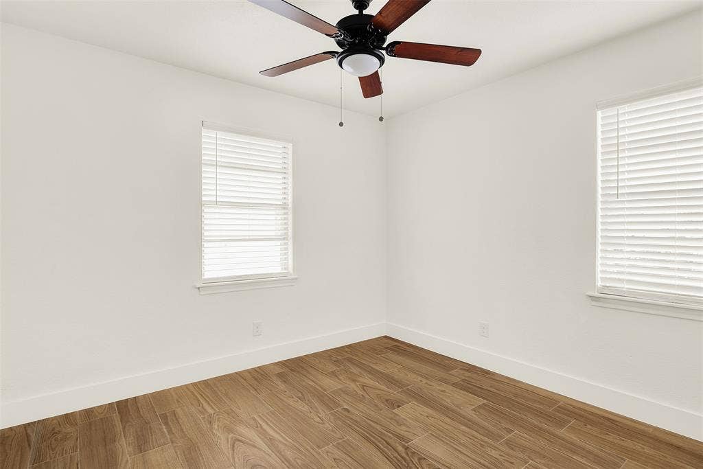 306 Hilltop Avenue, #A, Richardson, TX 75081 Second Bedroom with ceiling fan, light wood-type flooring, and plenty of natural light
