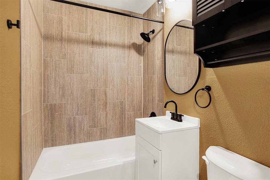 306 Hilltop Avenue, #A, Richardson, TX 75081 Everything Brand new..Full bathroom with tiled shower / bath, vanity, and toilet