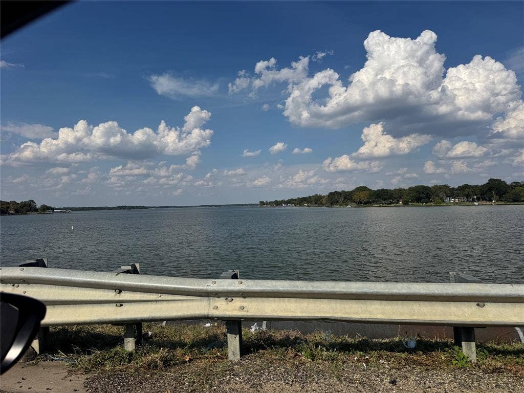 10122 Ash Cove, Wills Point, TX 75169 Expansive water frontage with mature trees along the shoreline