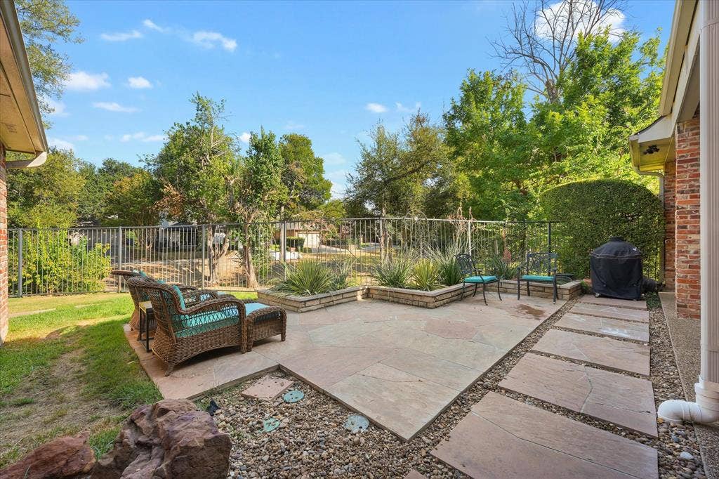 1312 Chippewa Drive, Plano, TX 75093 Enjoy morning light and an open greenbelt outlook from the rear patio.