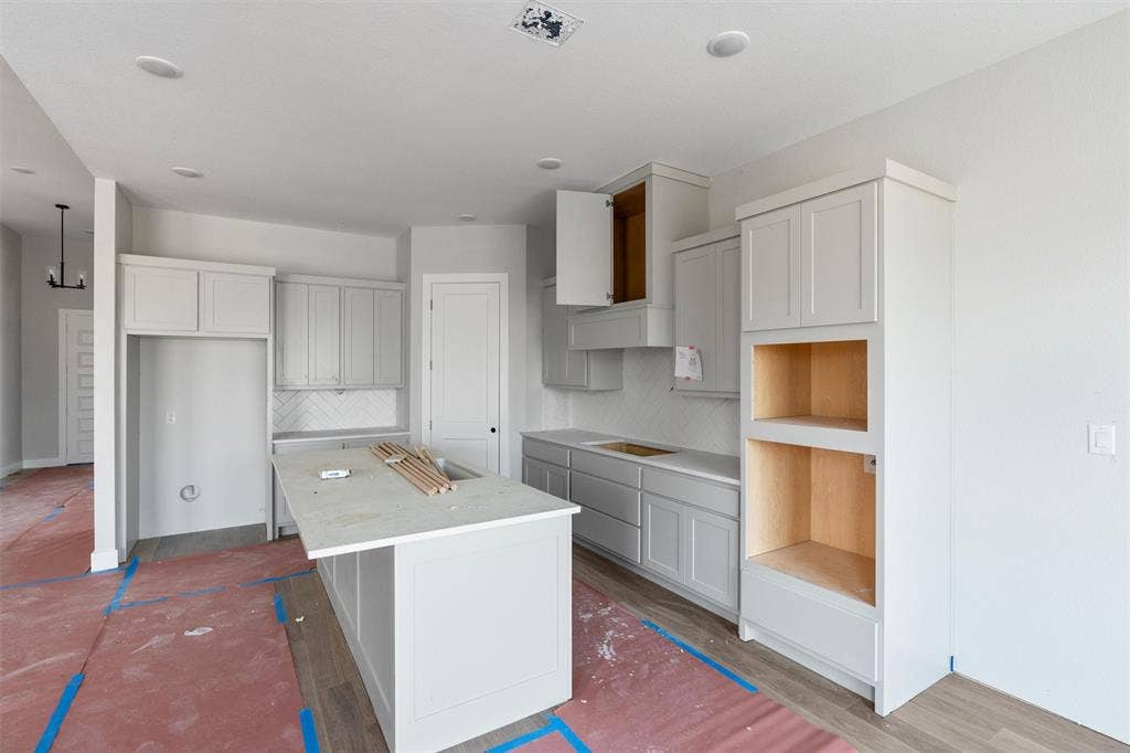 1312 Tahonta Drive, Hewitt, TX 76643 Kitchen featuring a center island, recessed lighting, shaker-style cabinetry, and a subway tile backsplash