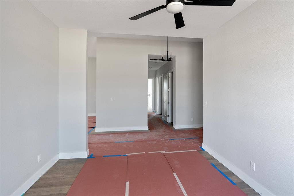 1312 Tahonta Drive, Hewitt, TX 76643 Wood-finish flooring with white trim