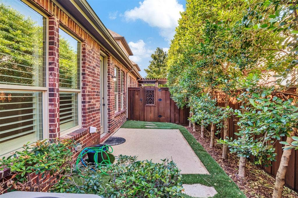 4817 BAYVIEW Drive, Plano, TX 75093 The backyard may be compact, but it's big enough to enjoy! Mature trees keep it private, and artificial turf means you never have to mow or weed or any other lawn maintenance!