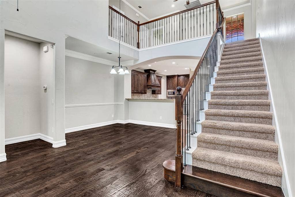 4817 BAYVIEW Drive, Plano, TX 75093 Soft carpet lines the stairs that lead to the game room and bedrooms above.