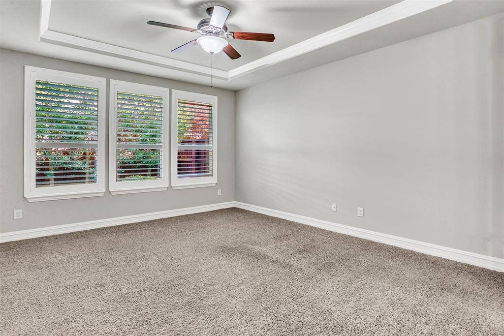 4817 BAYVIEW Drive, Plano, TX 75093 The master suite has Plantation shutters that overlook the backyard and crown molding.