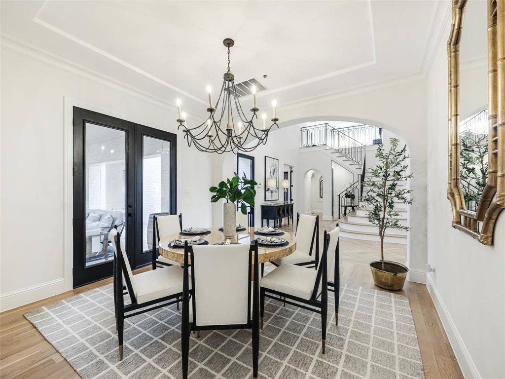 12313 Winding Hollow Lane, Frisco, TX 75033 The formal dining room is enhanced by decorative lighting and provides an elegant setting for special occasions and memorable dinners