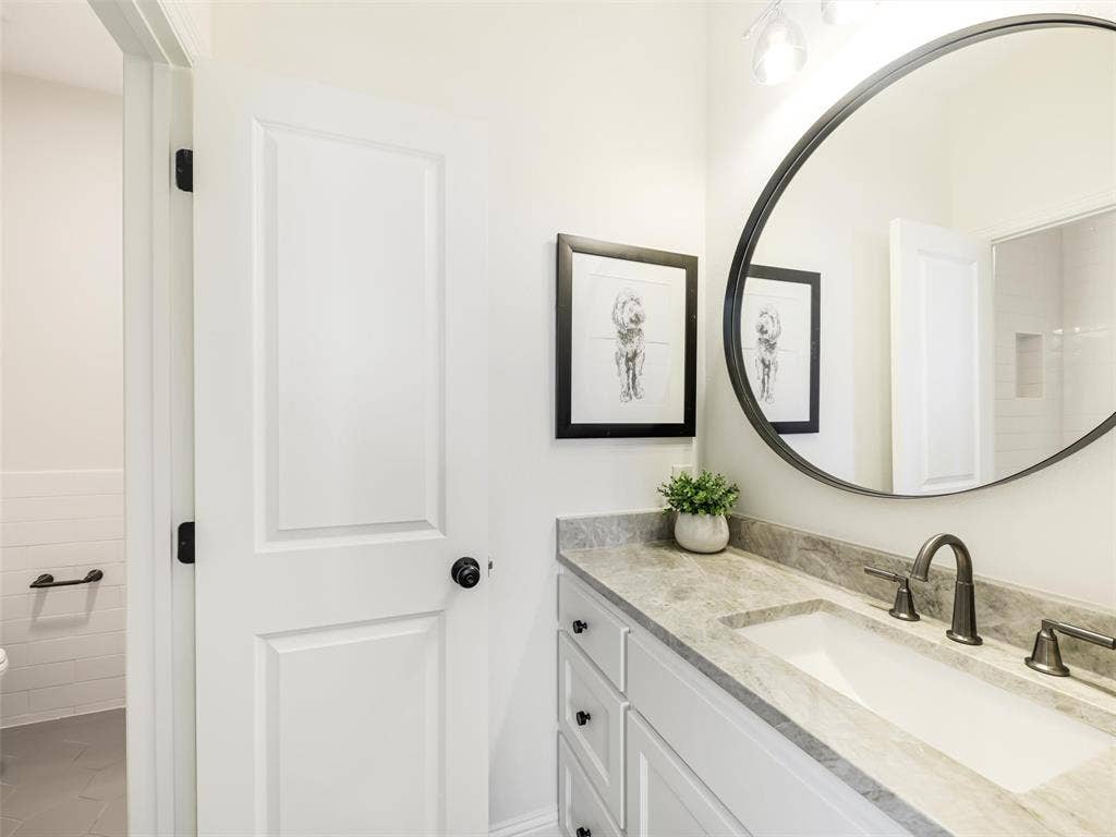 12313 Winding Hollow Lane, Frisco, TX 75033 Bathrooms are finished with a sophisticated selection of marble, quartzite, designer fixtures, and upscale equipment, continuing the elevated design aesthetic from one space to the next. Jack & Jill Vanity's: Taj Majal Quartzite