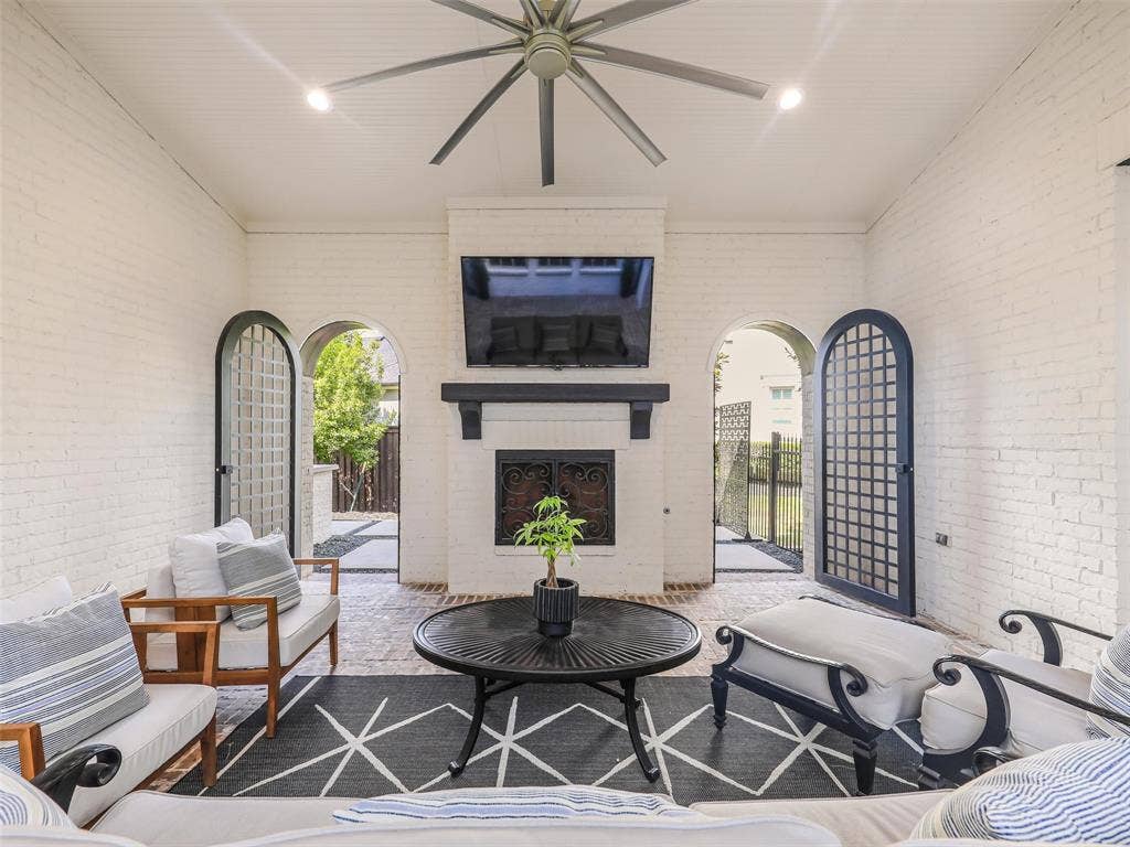 12313 Winding Hollow Lane, Frisco, TX 75033 A covered/uncovered 27x14x18 courtyard with a fireplace is right off of the private casita.