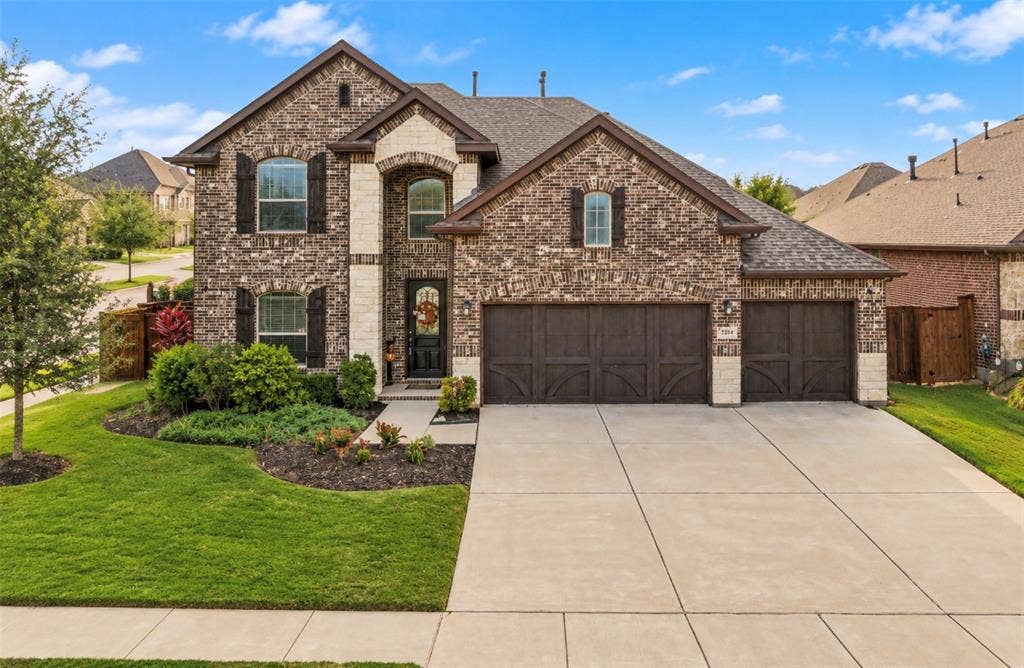 Front of Home with 3-Car Garage