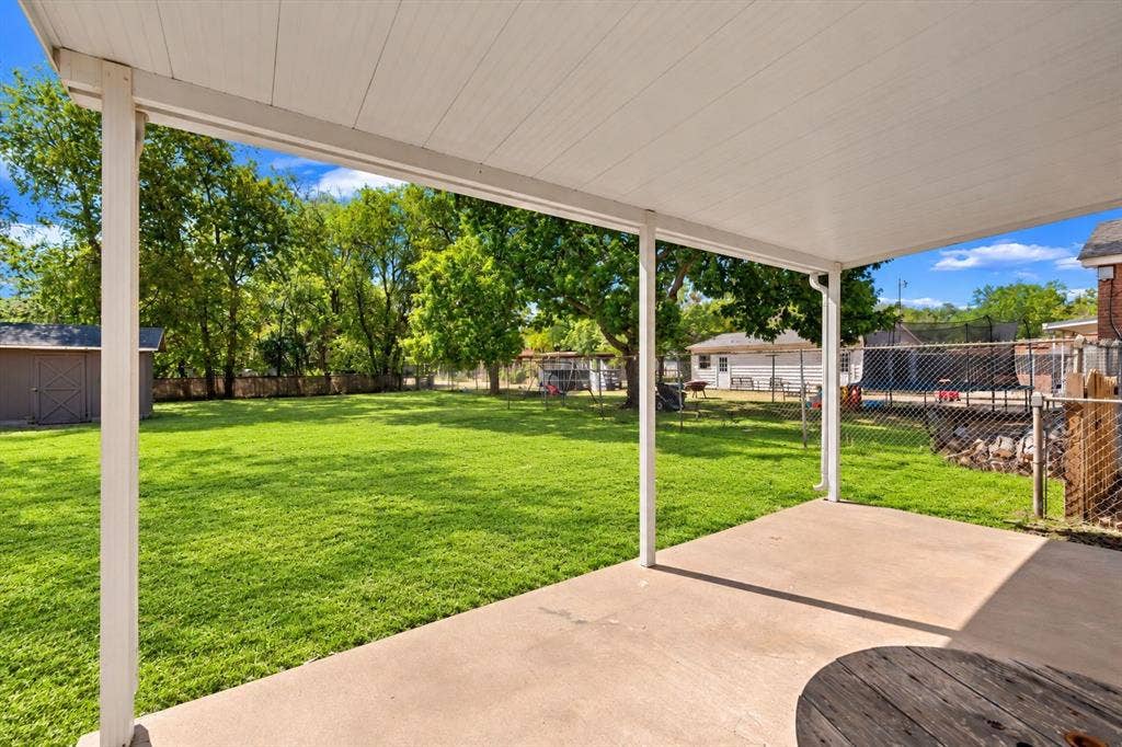905 S Tyler, McGregor, TX 76657 Yard enhanced by AI