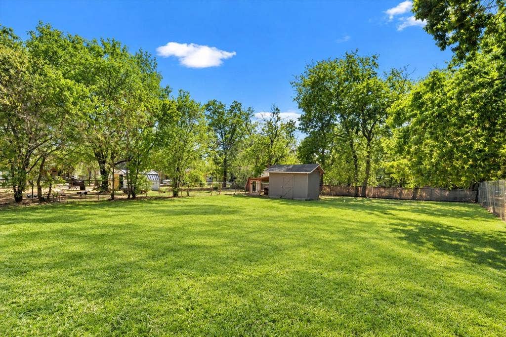 905 S Tyler, McGregor, TX 76657 Yard enhanced by AI