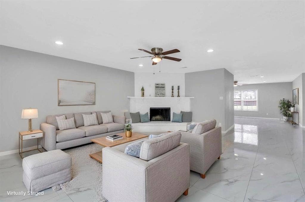 1509 California Trail, Grand Prairie, TX 75052 Spacious living area featuring light gray walls, recessed lighting, and a ceiling fan