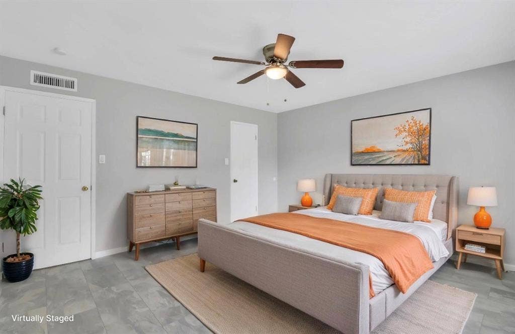 1509 California Trail, Grand Prairie, TX 75052 Bedroom with light gray walls, gray tile flooring, and a ceiling fan with integrated lighting