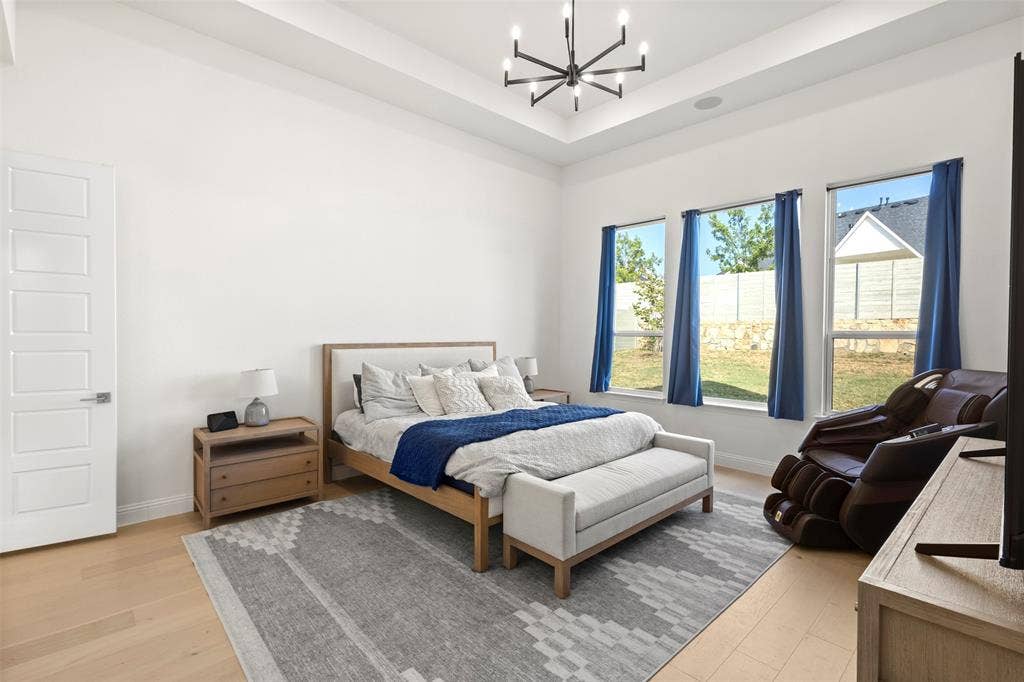 1708 Breezy Brook Lane, Argyle, TX 76226 Primary Bedroom with windows looking to Backyard
