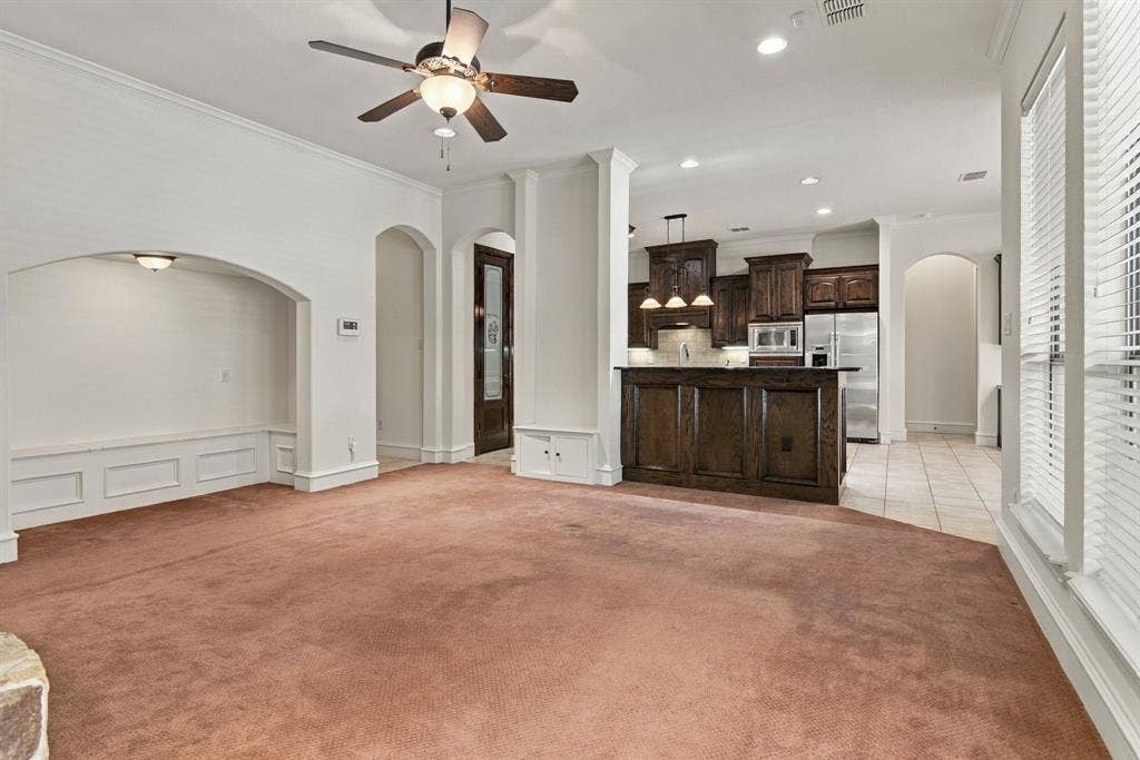 7004 Cherrybark Lane, North Richland Hills, TX 76182 Open-concept layout with recessed lighting and a ceiling fan