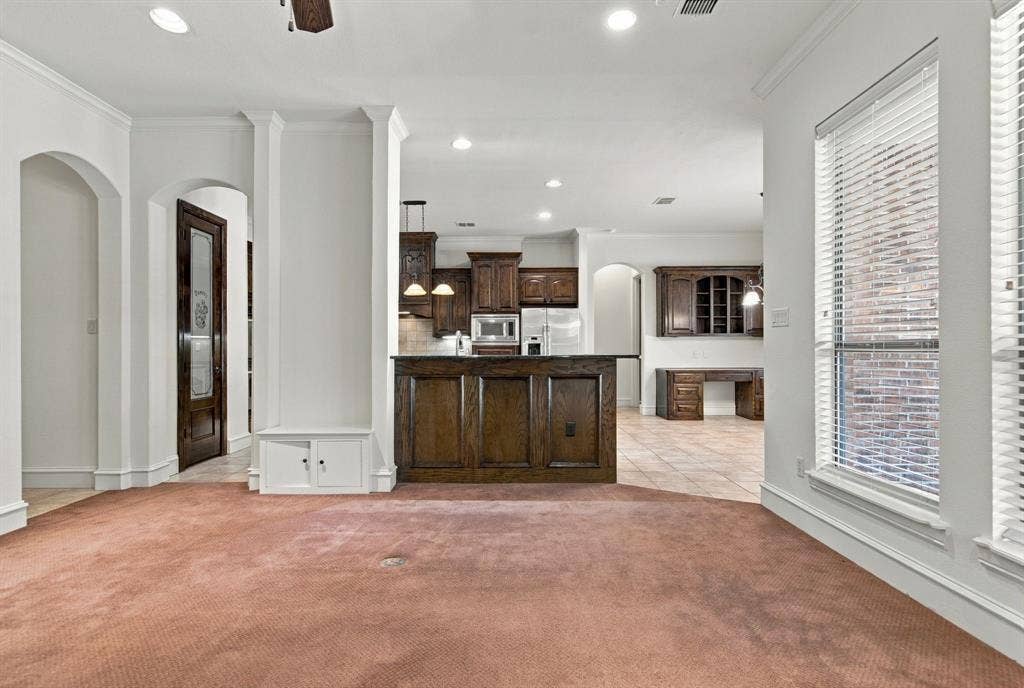 7004 Cherrybark Lane, North Richland Hills, TX 76182 Arched doorways, recessed lighting, and a built-in cabinet