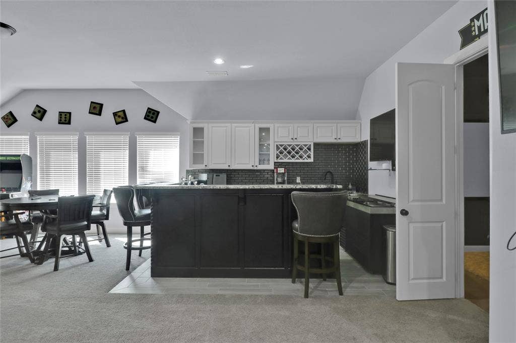Upstairs family room is perfect for entertaining guests.
