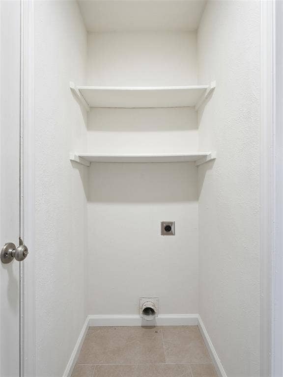 Built-in shelving for storage with tile flooring