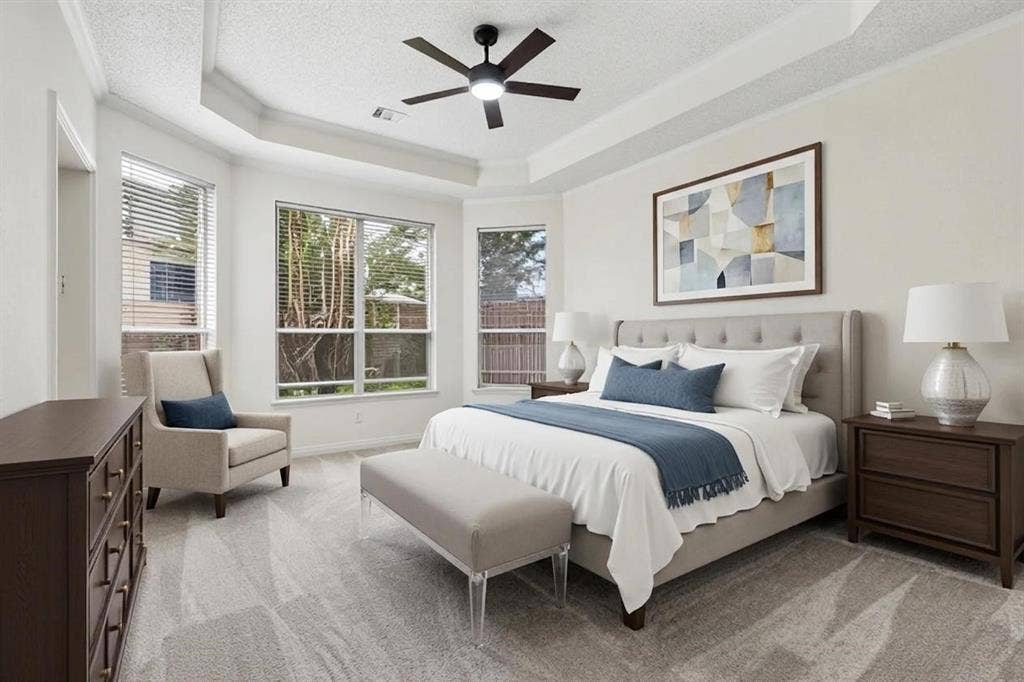 8121 Skyridge Drive, Plano, TX 75025 Spacious primary suite is privately located on the first floor and features tall ceilings and brand new carpet. *Virtually Staged*