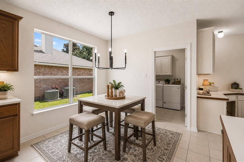 8121 Skyridge Drive, Plano, TX 75025 Light-filled breakfast nook provides casual dining space conveniently located between the kitchen and family room. *Virtually Staged*