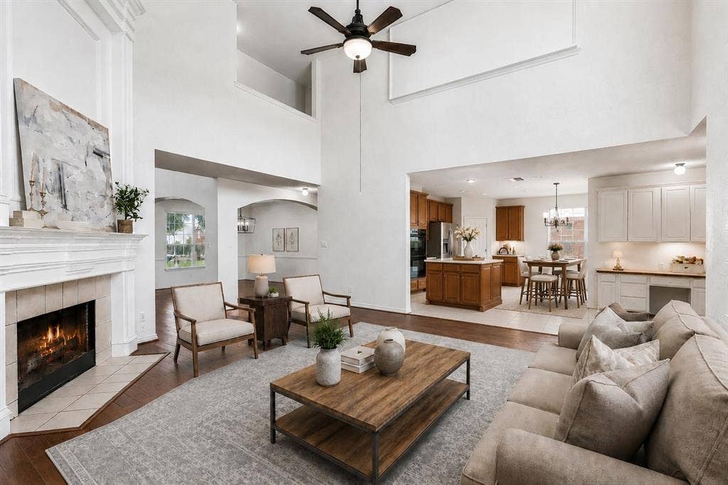 8121 Skyridge Drive, Plano, TX 75025 Open sightlines connect the family room, breakfast nook and kitchen for easy everyday living and entertaining. *Virtually Staged*