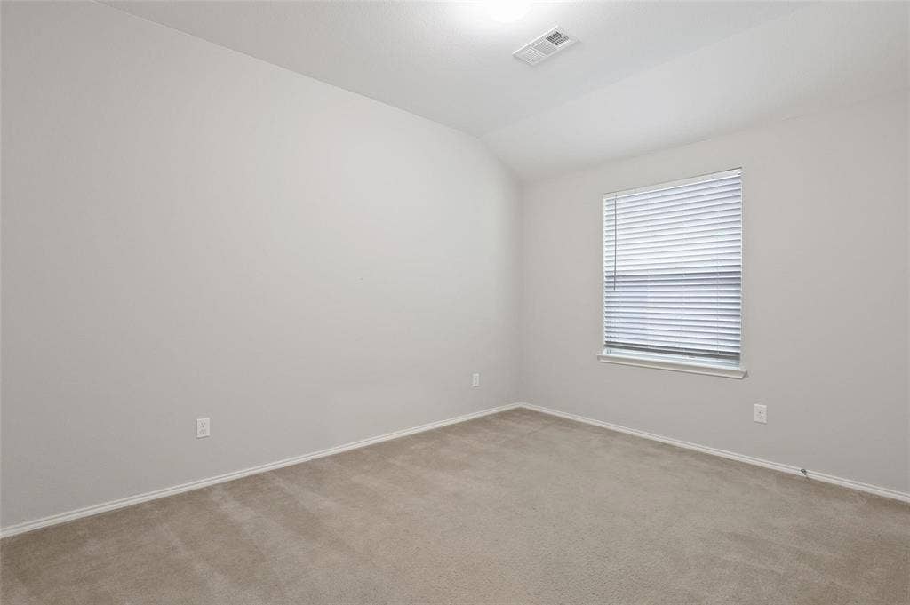 1725 Wildflower Lane, Wylie, TX 75098 Secondary bedroom will have LVT and a ceiling fan installed