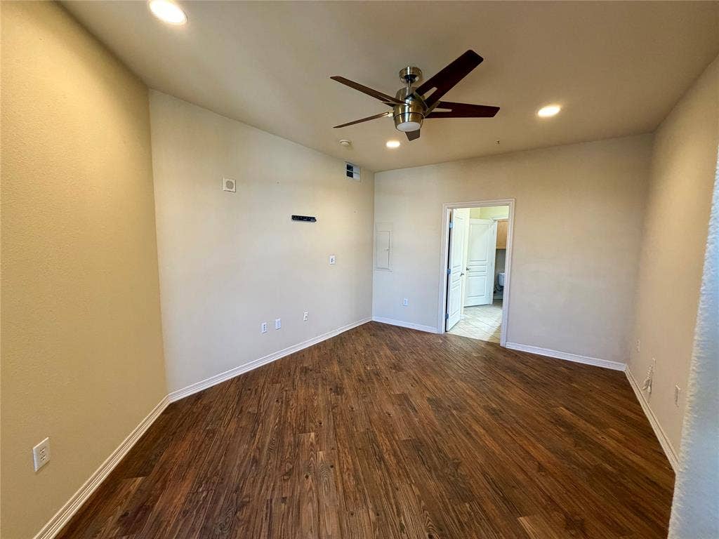 330 Las Colinas Boulevard E, #1006, Irving, TX 75039 Wood-finish flooring, recessed lighting, ceiling fan, and white trim