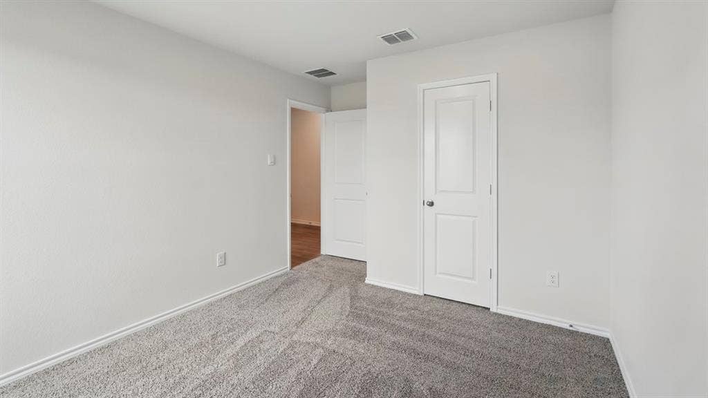 1924 Freeman Street, Tyler, TX 75704 Neutral wall finishes with crisp white trim