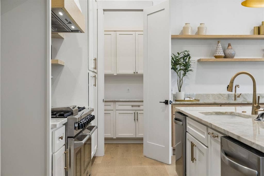 3027 Brooklyndell Avenue, Dallas, TX 75211 The kitchen includes a pantry with cabinetry