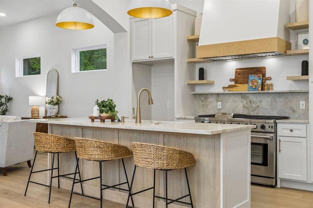 3027 Brooklyndell Avenue, Dallas, TX 75211 Contemporary kitchen featuring stainless steel appliances including a gas range