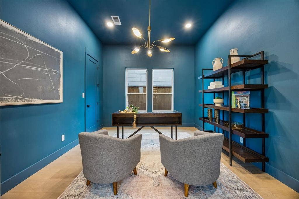 3027 Brooklyndell Avenue, Dallas, TX 75211 Dedicated office with recessed lighting and a contemporary chandelier. This room has a closet and could also be a bedroom