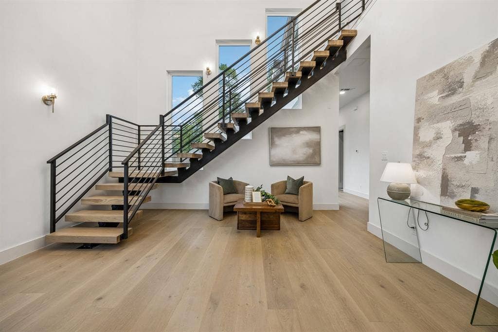 3027 Brooklyndell Avenue, Dallas, TX 75211 Large entry with a modern staircase leading to the 2nd floor