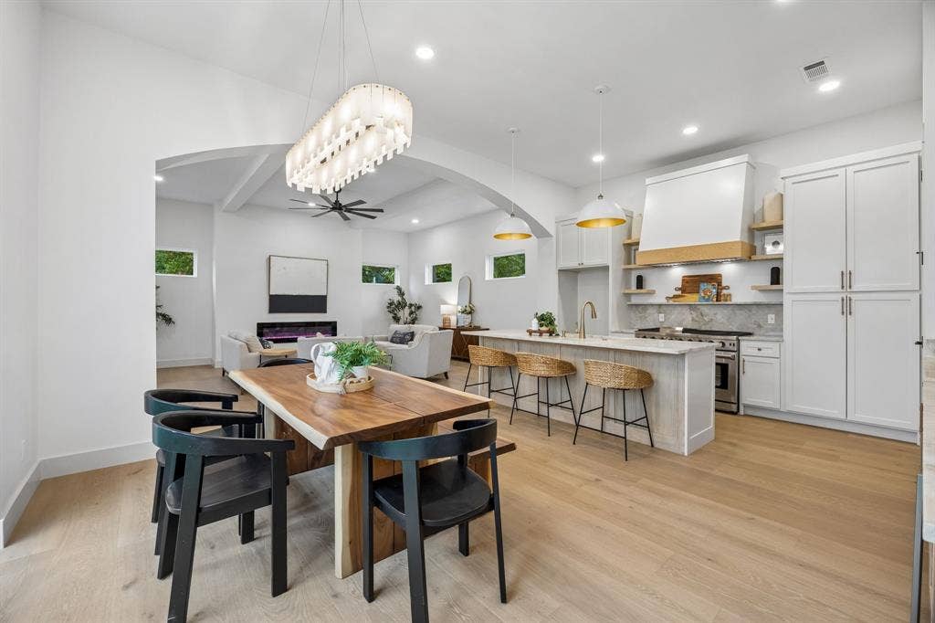 3027 Brooklyndell Avenue, Dallas, TX 75211 Dining area with a modern chandelier.