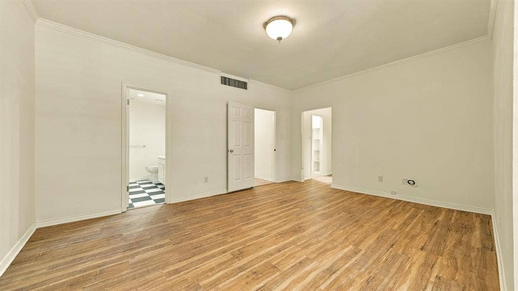 4325 Bellaire Drive S, Fort Worth, TX 76109 newer luxury vinyl wood flooring, high ceilings, crown molding