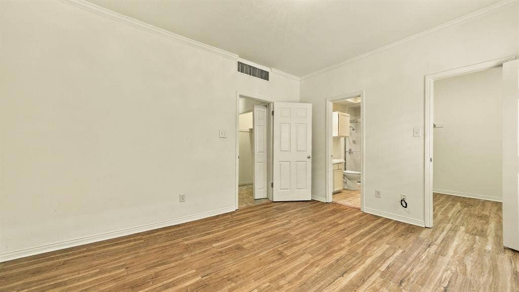 4325 Bellaire Drive S, Fort Worth, TX 76109 crown molding, newer luxury vinyl floors, large closet, full bath lots of cabinets, large mirror