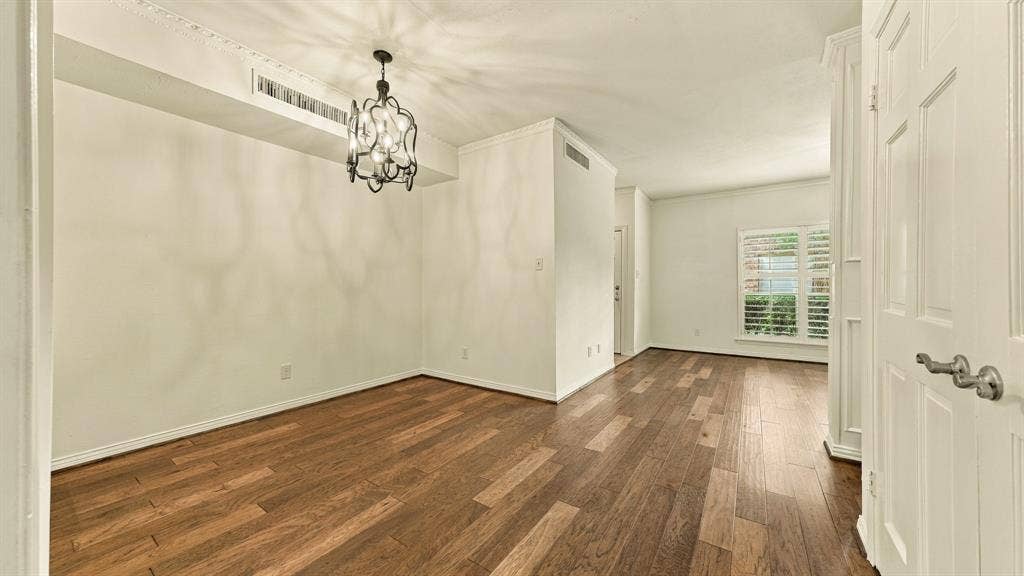 4325 Bellaire Drive S, Fort Worth, TX 76109 standing at den door view of dining & living rooms, newer wood plank floors, crown moldig,high ceiling's