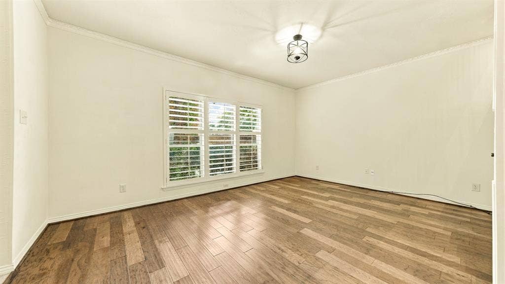 4325 Bellaire Drive S, Fort Worth, TX 76109 high ceilings, crown molding, wood plank flooring, newer windows, plantation shutters