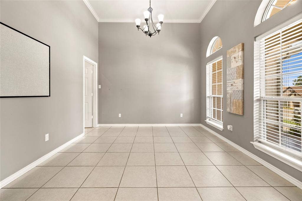 618 Huntwick Lane, Tyler, TX 75703 Tile flooring complemented by tall ceilings and crown molding