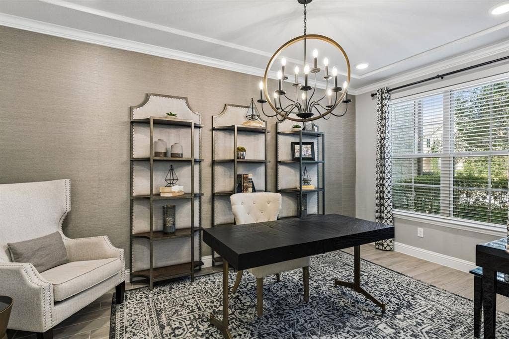 3707 Roth Drive, McKinney, TX 75071 Elegant private study features sophisticated textured walls, oversized windows, and a statement chandelier creating a polished workspace.
