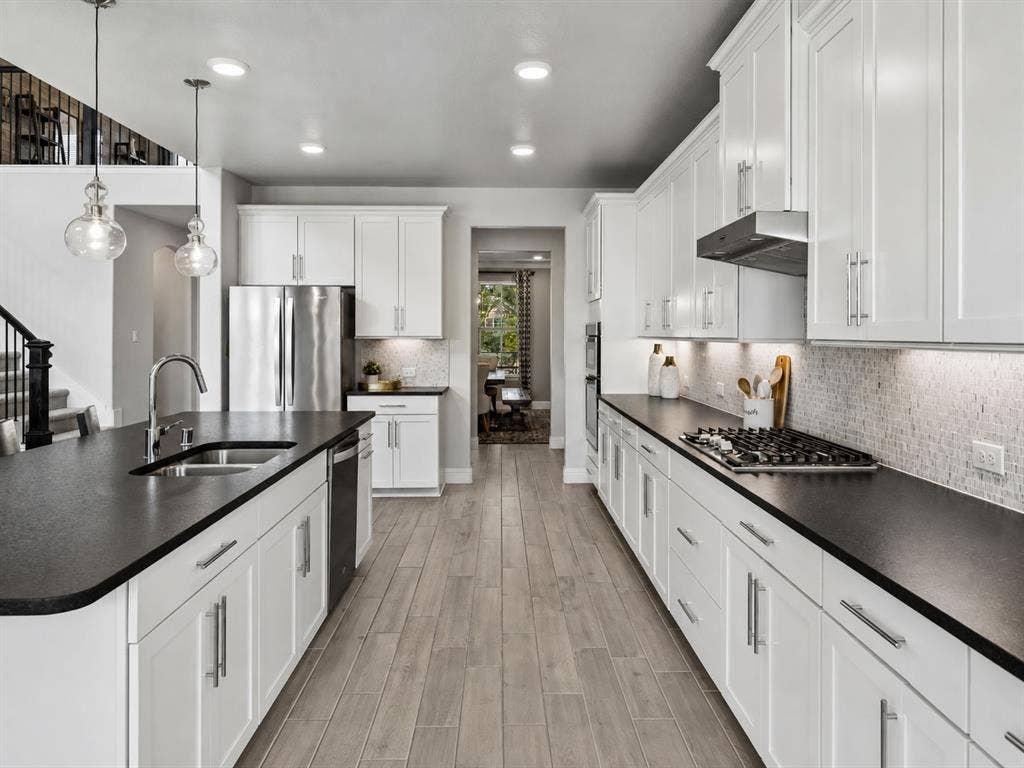 3707 Roth Drive, McKinney, TX 75071 You will love prepping and serving food in this gourmet kitchen!