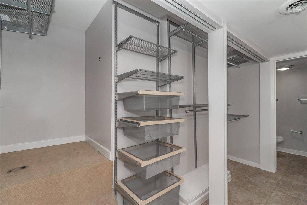 4930 Thunder Road, Dallas, TX 75244 Adjustable wire shelving system with integrated wire mesh drawers and hanging rods