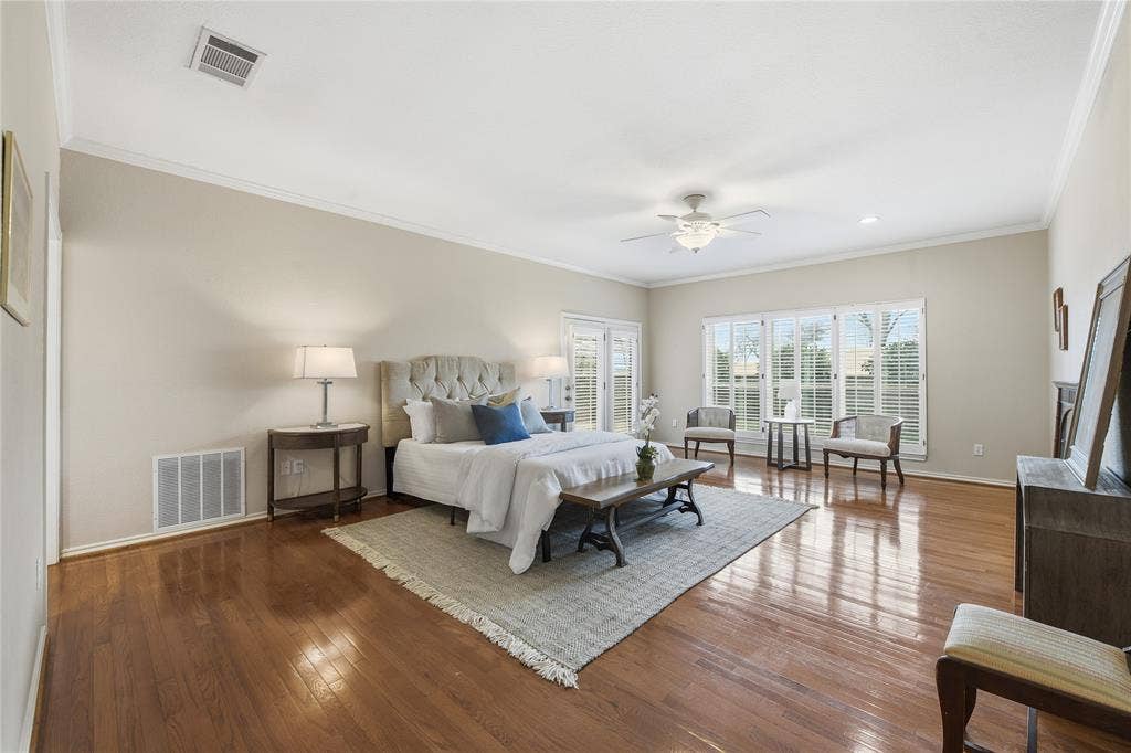 4424 Westridge Avenue, Fort Worth, TX 76116 Hardwood flooring, crown molding, white plantation shutters, ceiling fan, and recessed lighting