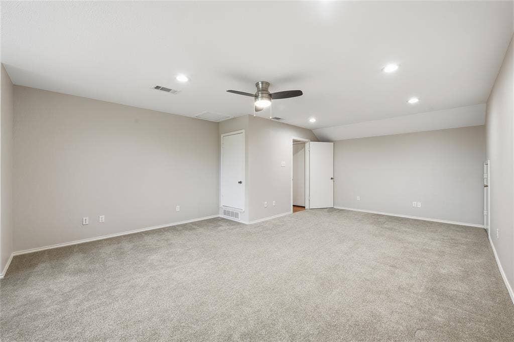 4424 Westridge Avenue, Fort Worth, TX 76116 Expansive room featuring light gray carpeting, recessed lighting, a ceiling fan, and painted interior doors