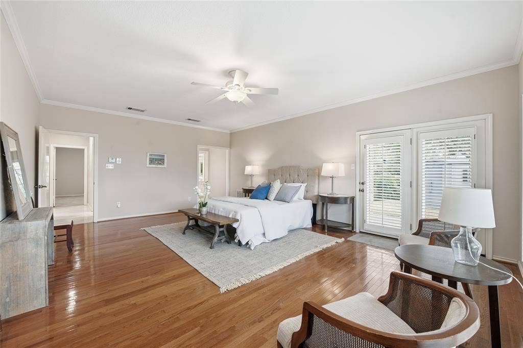 4424 Westridge Avenue, Fort Worth, TX 76116 Hardwood flooring, crown molding, double French doors with interior blinds, and a ceiling fan