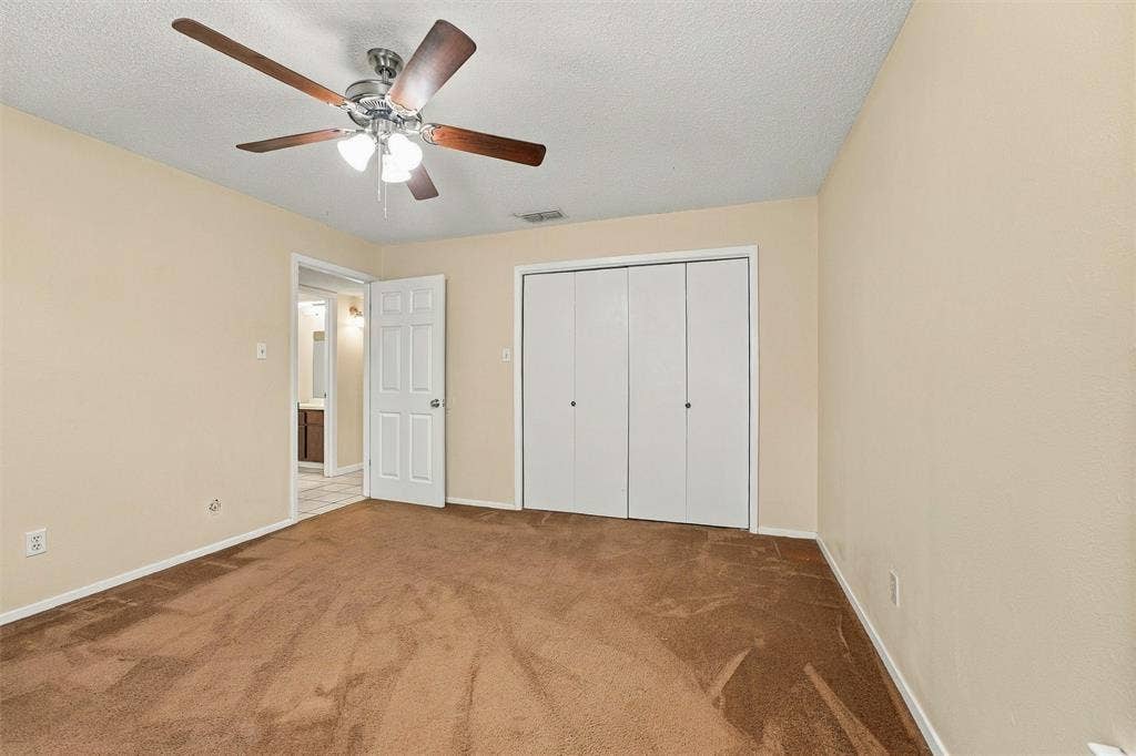 410 W Franklin Street, #5, Waxahachie, TX 75165 Room featuring brown carpet flooring and light-toned wall paint
